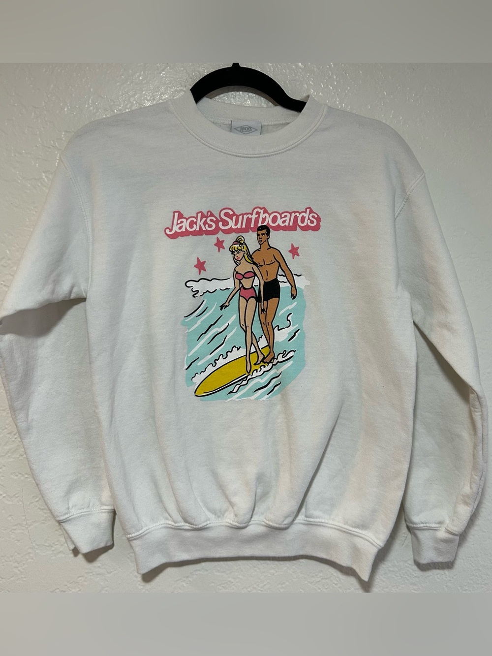 Jack’s Surfboards Barbie and Ken Surfing White Graphic Crewneck Sweatshirt